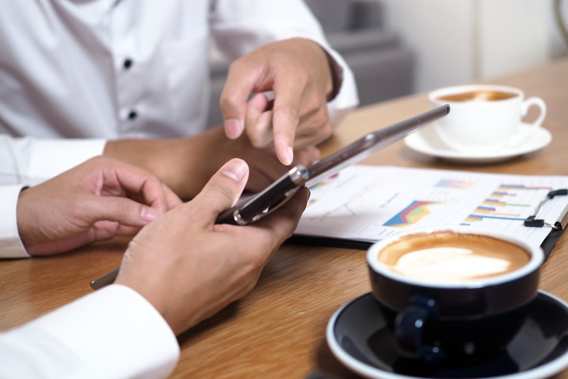 People Having a Meeting Over Coffee